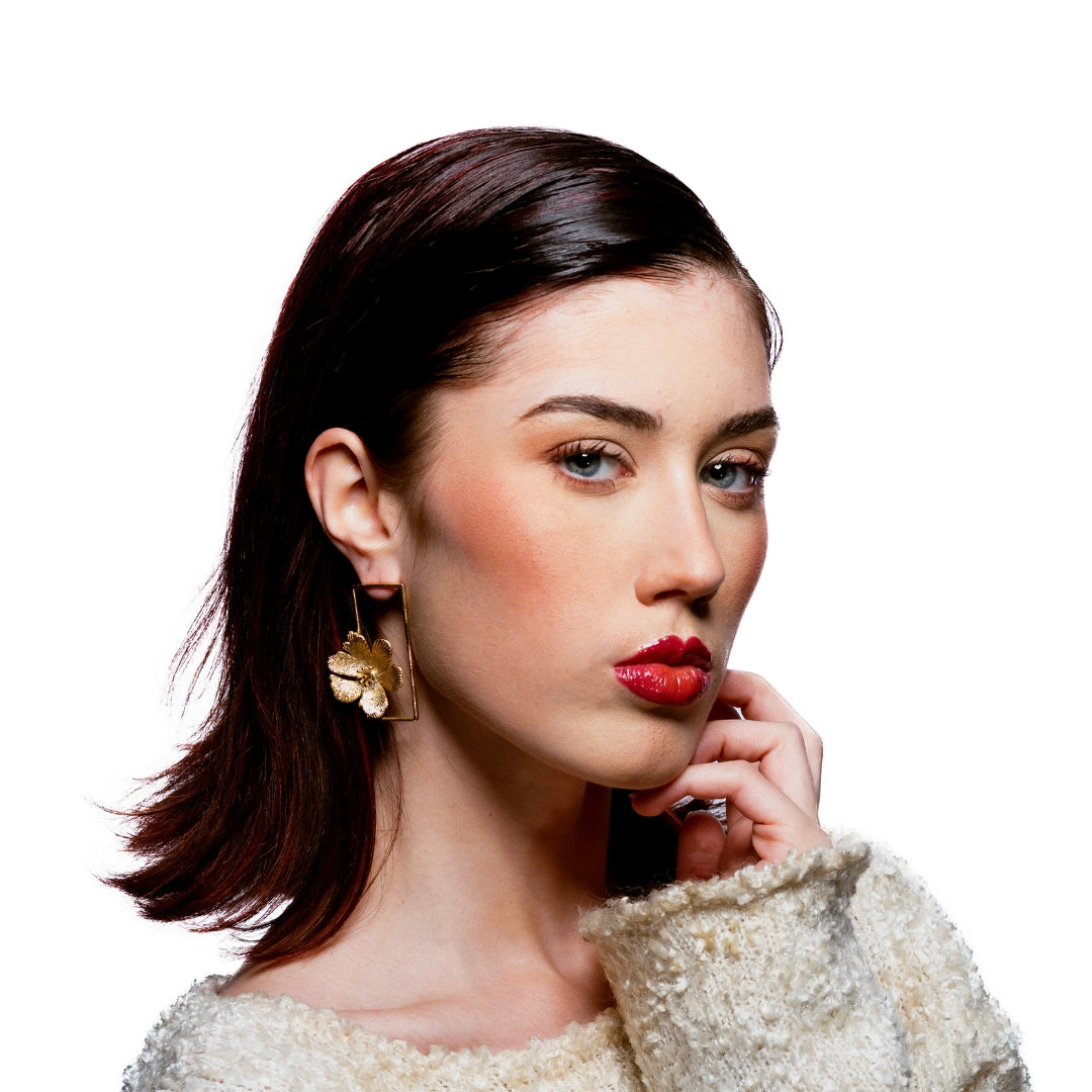Profile view of model wearing Bloom Collection floral rectangle earrings – nature-inspired gold statement jewelry