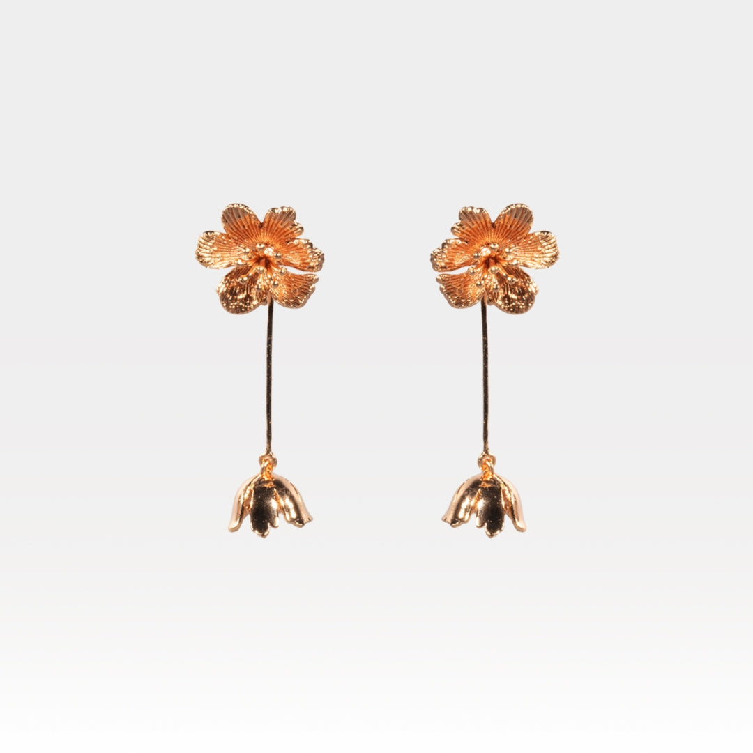 Close-up of rose gold floral drop earrings – handcrafted botanical jewelry by House of Kiash