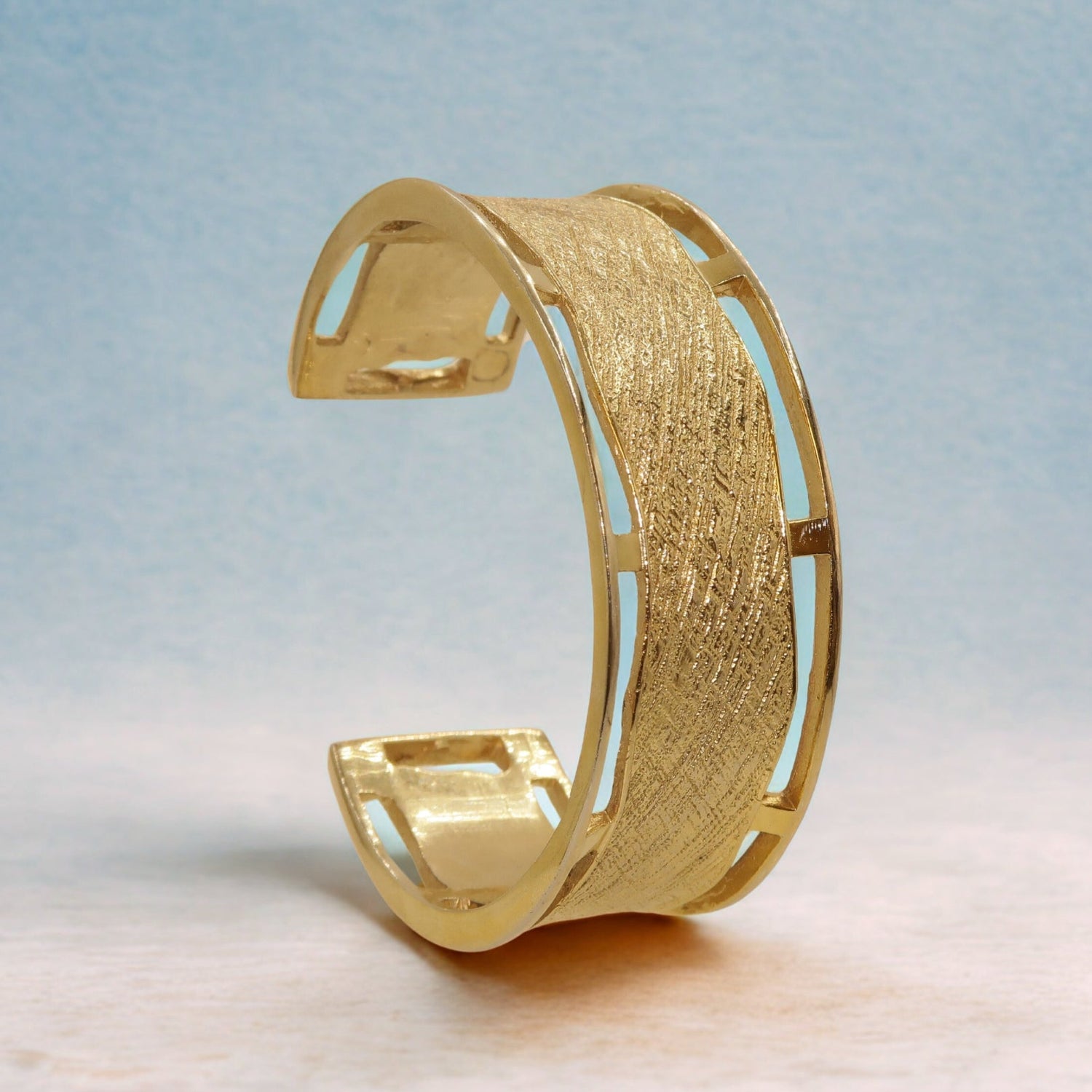 Abstract 18K gold-plated jewelry from the Contour Collection by House of Kiash – featuring organic curves, textured finishes, and bold sculptural silhouettes.