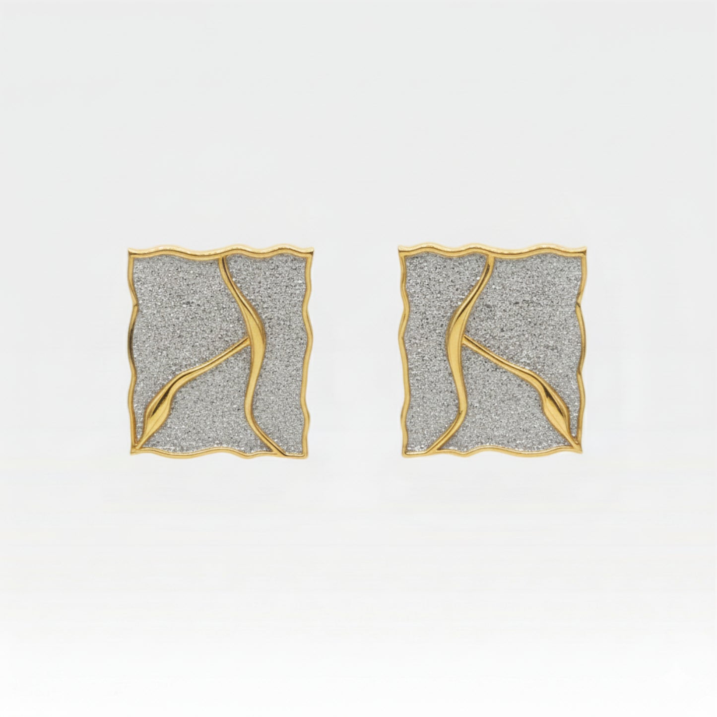 Kintsugi square stud earrings pair with textured silver and gold veining, Japanese-inspired statement earrings
