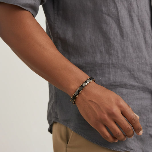 Rose gold and faceted black ceramic link bracelet with a luxurious design.