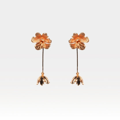Close-up of rose gold floral drop earrings – handcrafted botanical jewelry by House of Kiash
