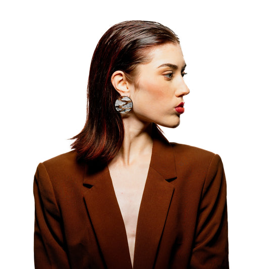 Model wearing large gold stud earrings – round 18k statement studs for everyday wear